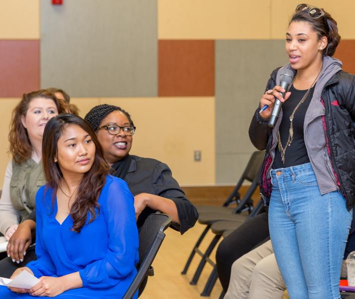 Student and community members ask question of Boston City Councilor Michelle Wu about challenges facing communities in the city of Boston during a 2017 public event.