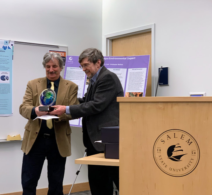 Professor John Hayes presents the Friend of the Earth award to Salem City Counc…