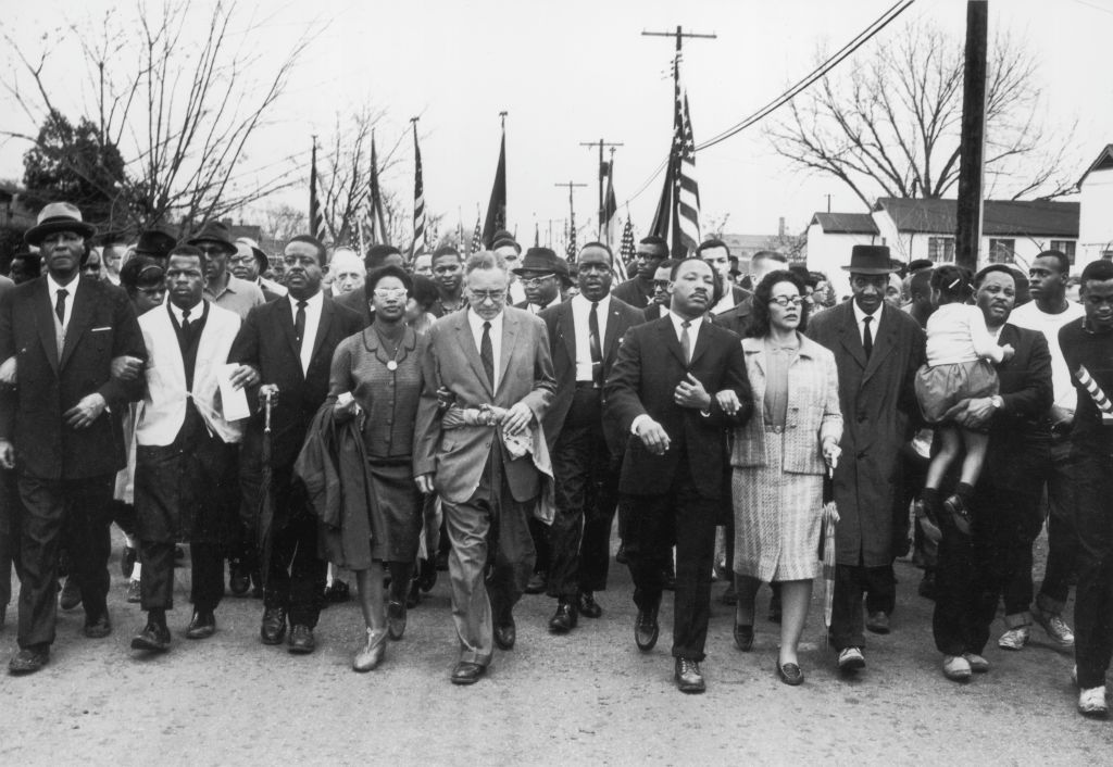 Martin Luther King, Jr. and other civil rights leaders marching together