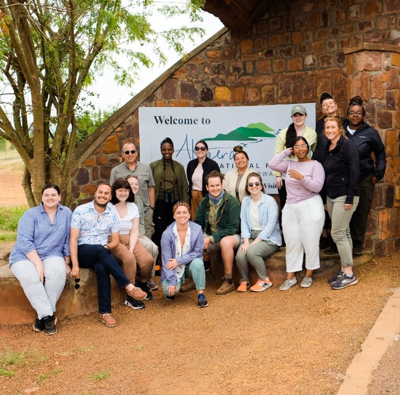 Dr. Dan Eshet and students from Salem State University at the entrance of Akagera National Park in the summer of 2022