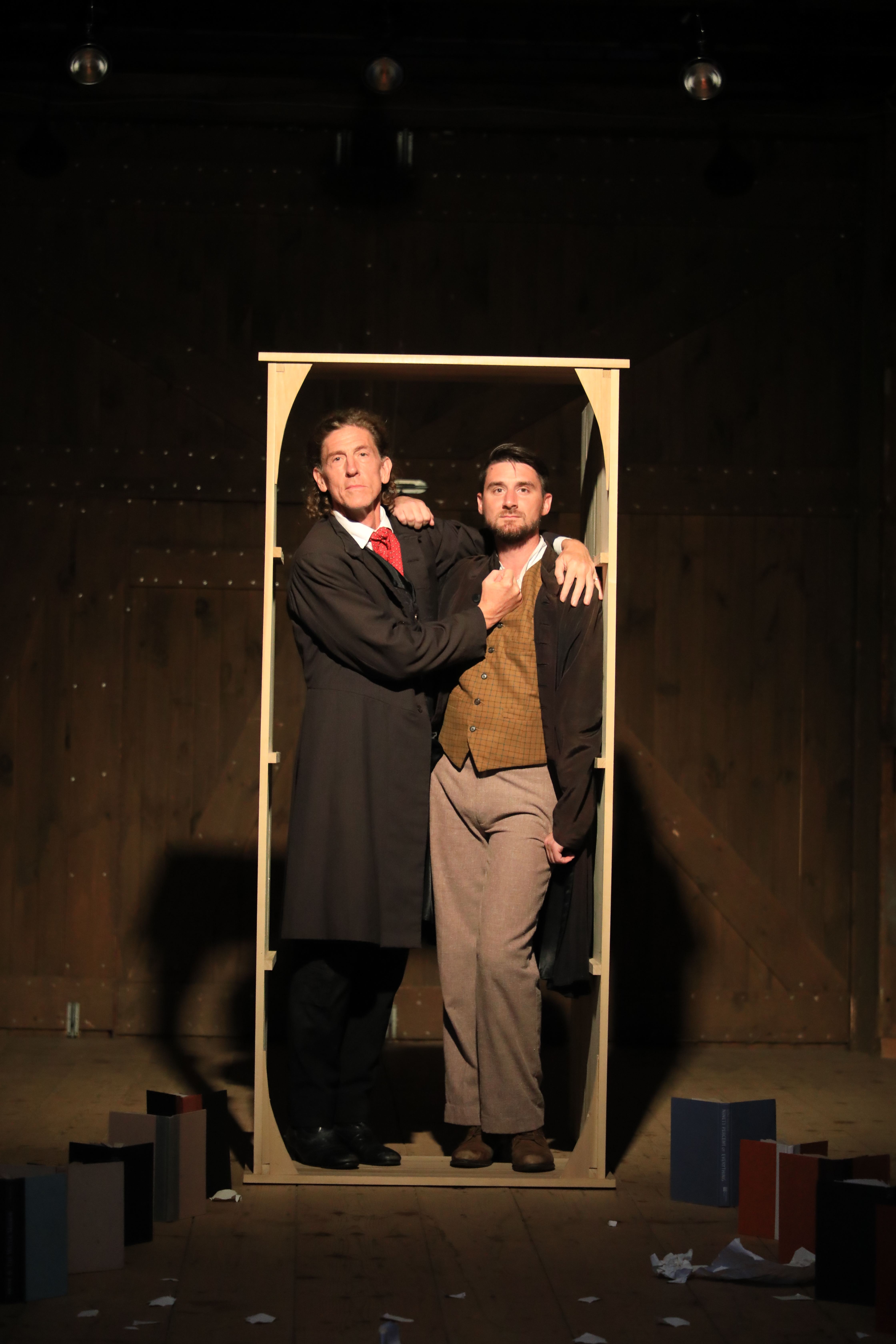 Tom Truss and Matthew Cumbie in a door frame in Rewritten