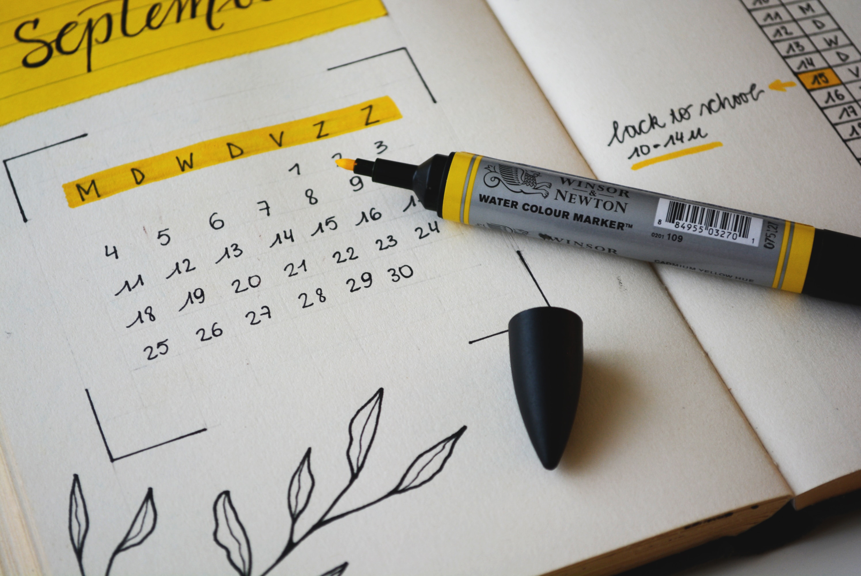 Monthly planner with splash of yellow.