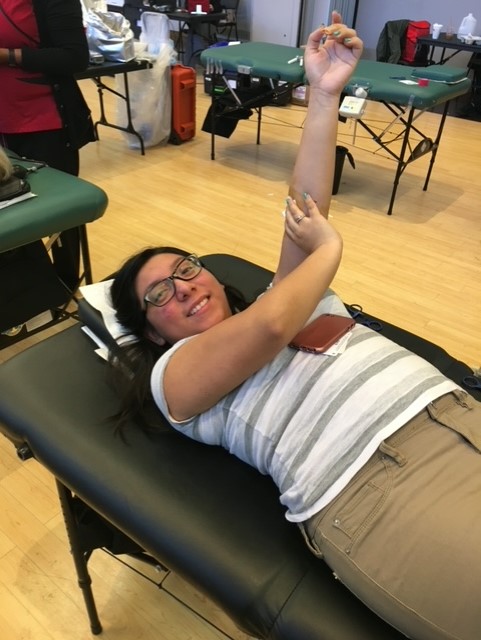Student in the process of donating blood in Vets Hall