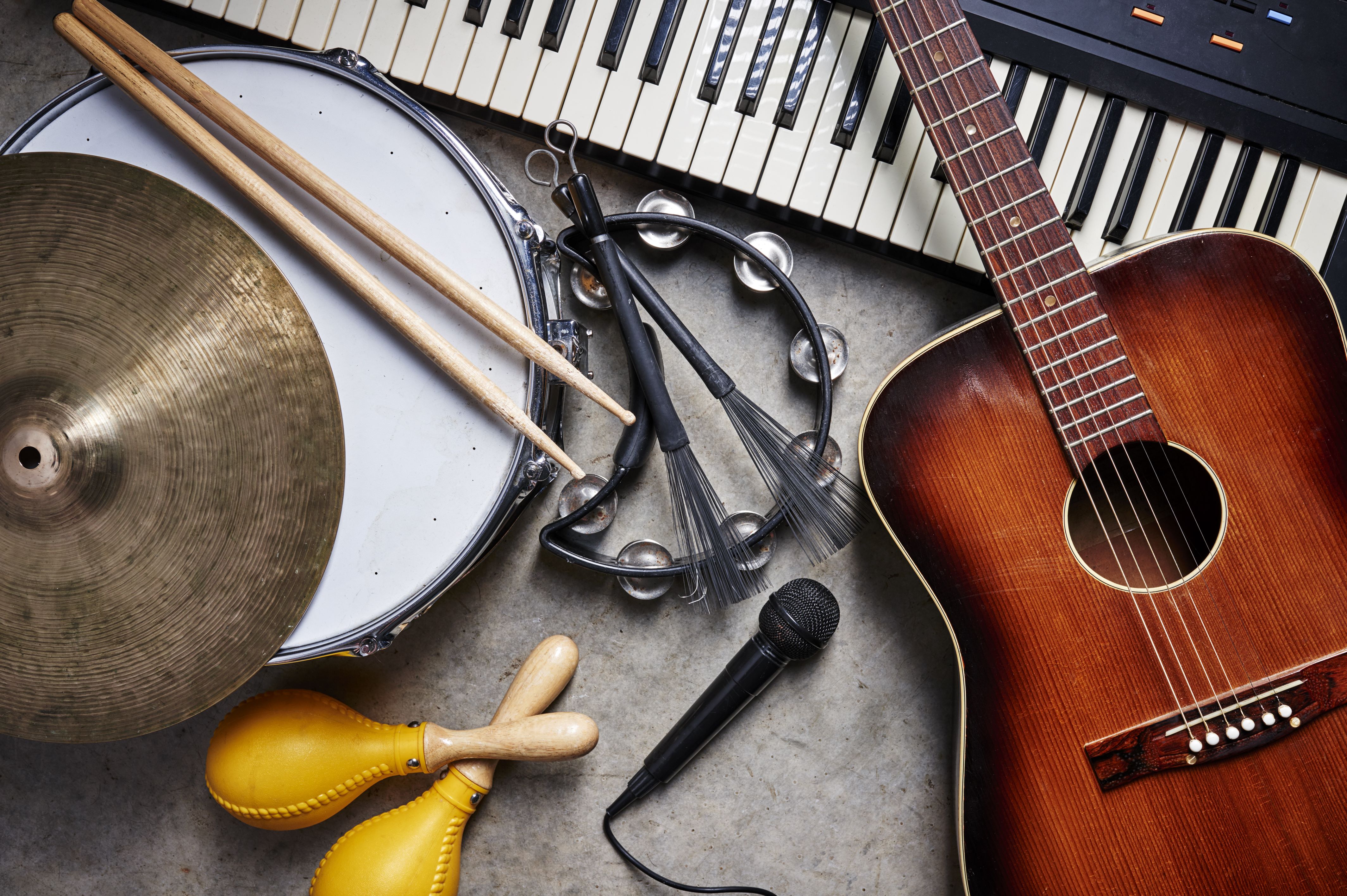 Various musical instruments piled on top of one another