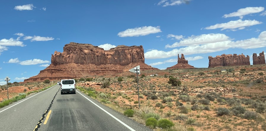 One of our vans and the southwest landscape we drove through