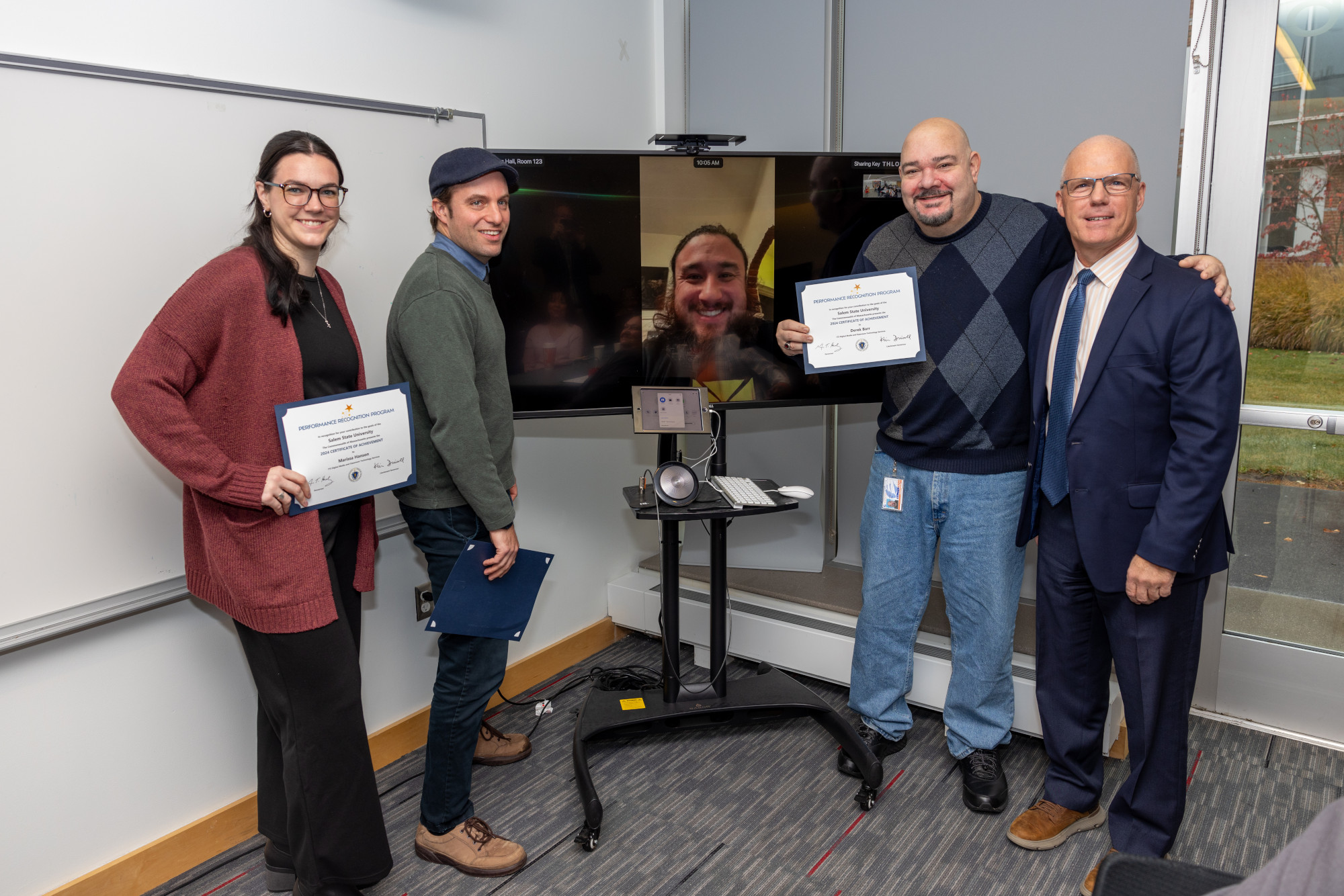 SSU ITS employees Marissa Hanson, David Walker, Jason Hagberg (on a HyFlex cart), assistant director Derek Barr, and President John Keenan