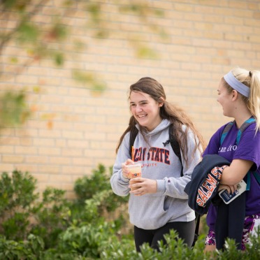 Female students walking to class on North Campus