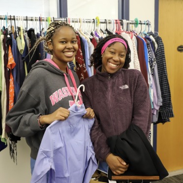 Career Closet two women with clothing