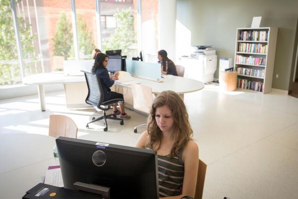 students at library computers