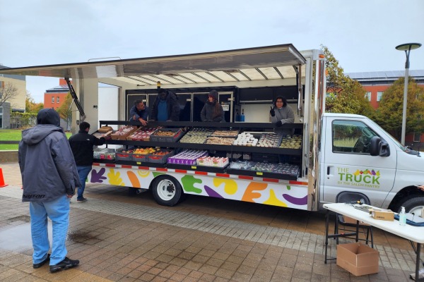 Mobile Food Market truck on campus giving food to students