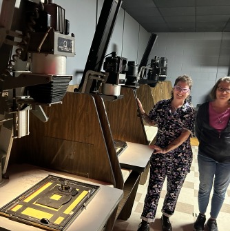 Black and white film photography is seeing a resurgence at Salem State University, where a darkroom is seeing more and more demand. Standing in the space are: Jessica Martineau, adjunct faculty member; and Kimberly Mimnaugh, staff assistant, both of