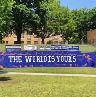 Mural painted on Salem State campus that reads, 'The World is Yours'