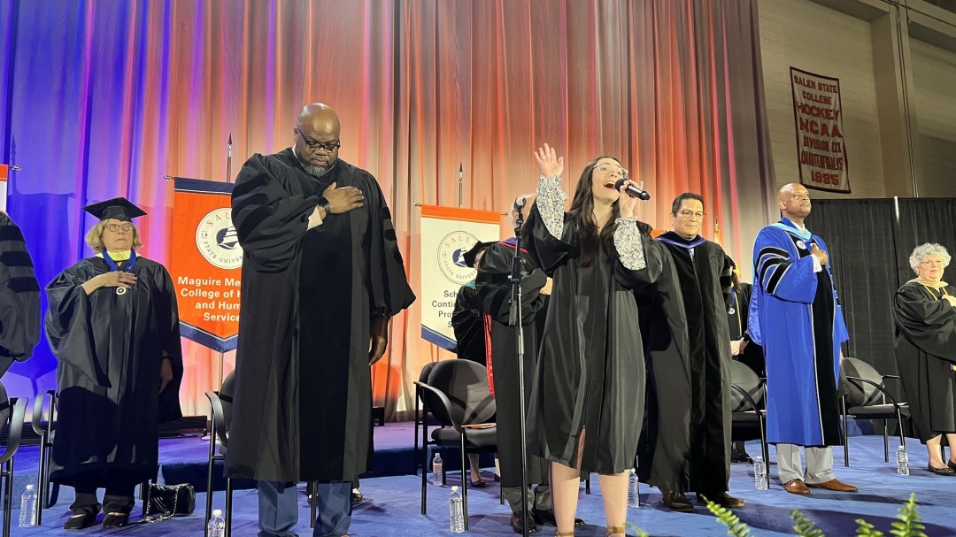 Student singer at commencement 2024