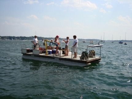 Researchers on a boat in Salem Sound