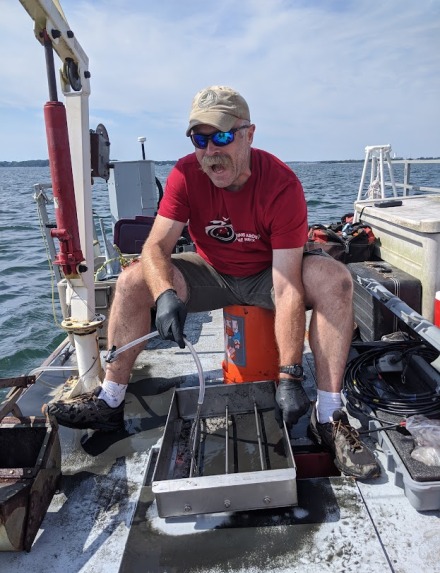 Professon Brad Hubeny in the field